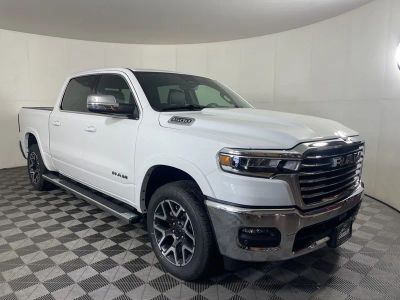 2026 RAM 1500 RAM 1500 LARAMIE CREW CAB 4X4 5'7' BOX in Bright White Clear-Coat Exterior Paint — front three-quarter view