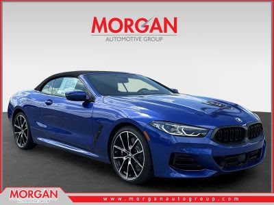 2026 BMW 8 Series 840i in Blue — front three-quarter view
