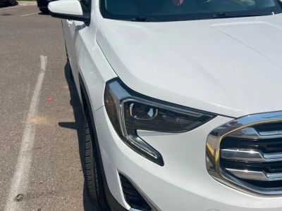 2019 GMC Terrain SLT in Summit White — front three-quarter view