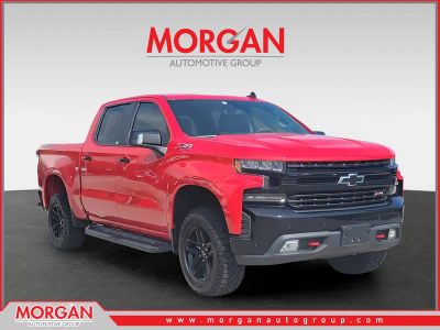 2020 Chevrolet Silverado 1500 LT Trail Boss in Red Hot — front three-quarter view