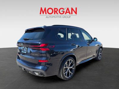2026 BMW X5 — rear three-quarter view