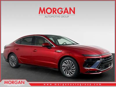 2025 Hyundai Sonata Hybrid Limited in Red — front three-quarter view