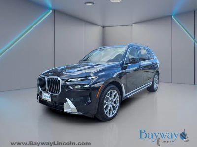 2025 BMW X7 — rear three-quarter view