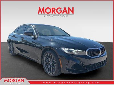 2025 BMW 3 Series 330i in Black — front three-quarter view