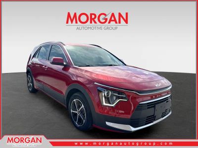 2023 Kia Niro EX in Runway Red — front three-quarter view