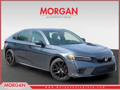 2023 Honda Civic Sport Touring — front three-quarter view