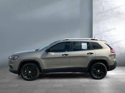 2021 Jeep Cherokee — rear three-quarter view