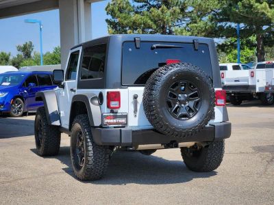 2015 Jeep Wrangler — rear three-quarter view
