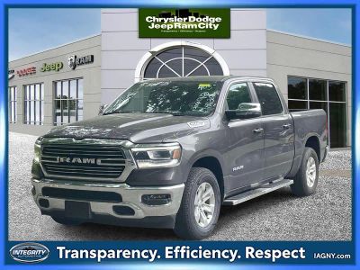 2023 RAM 1500 Laramie Crew Cab 4x4 5'7' Box in Granite Crystal Metallic Clearcoat — front three-quarter view