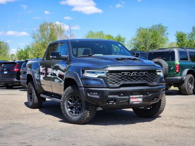 2026 RAM 1500 RAM 1500 RHO CREW CAB 4X4 5'7' BOX in Forged Blue Metallic Exterior Paint — front three-quarter view