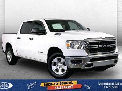 2023 RAM 1500 Big Horn Crew Cab 4x4 5'7' Box in Bright White Clearcoat — front three-quarter view
