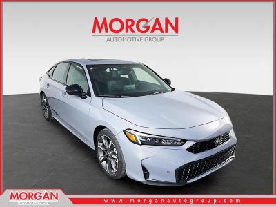 2026 Honda Civic Sedan Hybrid Sport Touring in Urban Gray Pearl — front three-quarter view