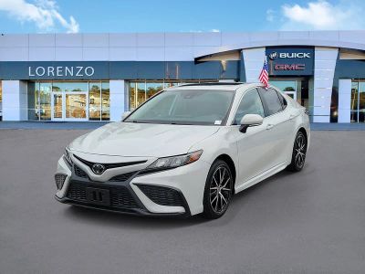 2024 Toyota Camry SE in Predawn Gray Mica — front three-quarter view