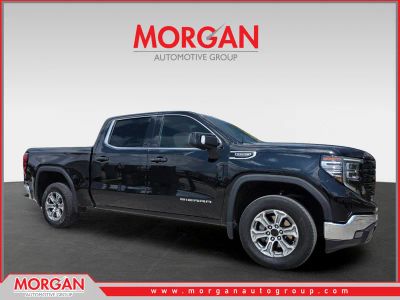 2024 GMC Sierra 1500 SLT in Black — front three-quarter view
