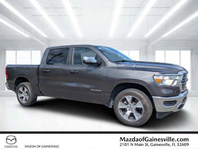 2024 Ram 1500 Laramie in Gray — front three-quarter view