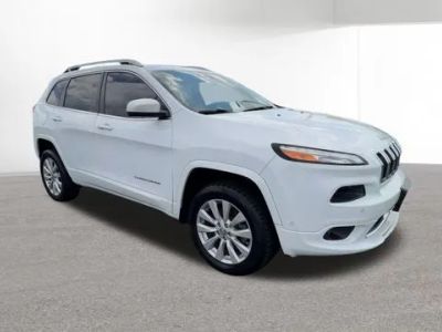 2016 Jeep Cherokee — side profile view