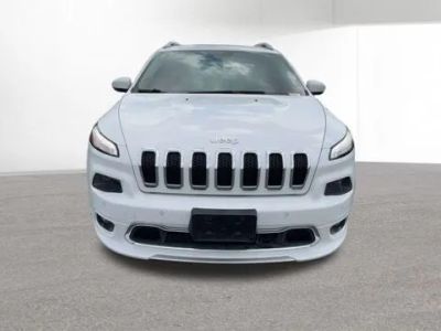 2016 Jeep Cherokee — rear three-quarter view