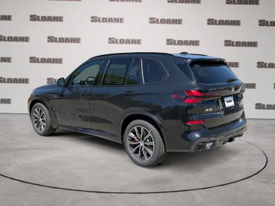 2026 BMW X5 — rear three-quarter view