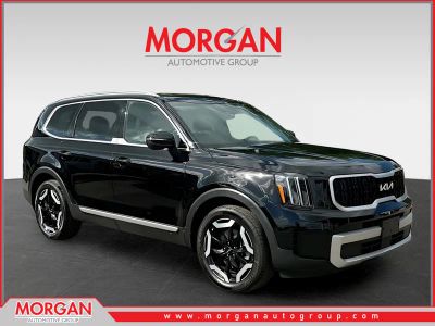 2024 Kia Telluride EX in Black — front three-quarter view