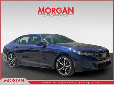 2026 BMW 5 Series 530i xDrive in Blue — front three-quarter view