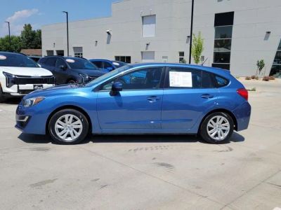 2016 Subaru Impreza — side profile view
