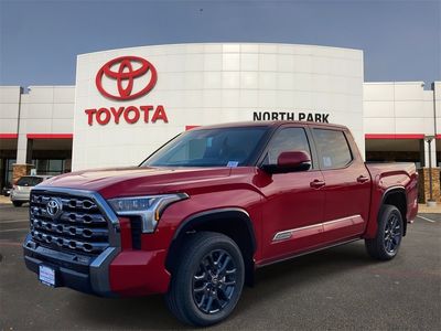 2026 Toyota Tundra Platinum in Supersonic Red — front three-quarter view