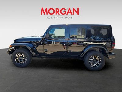 2025 Jeep Wrangler — rear three-quarter view