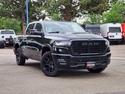 2026 RAM 1500 RAM 1500 LARAMIE CREW CAB 4X4 5'7' BOX in Diamond Black Crystal Pearl-Coat Exterior Paint — front three-quarter view