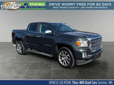 2021 GMC Canyon Denali in Hunter Green — front three-quarter view