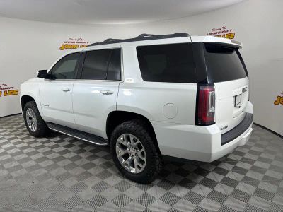 2016 GMC Yukon — rear three-quarter view