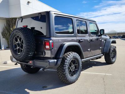 2026 Jeep Wrangler — rear three-quarter view