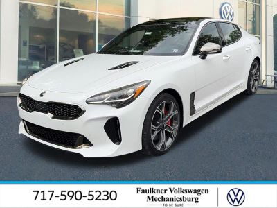 2019 Kia Stinger GT1 AWD in Snow White Pearl — front three-quarter view