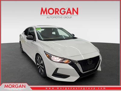 2023 Nissan Sentra SV in Aspen White Tricoat — front three-quarter view