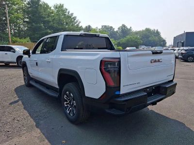 2026 GMC Sierra EV — rear three-quarter view