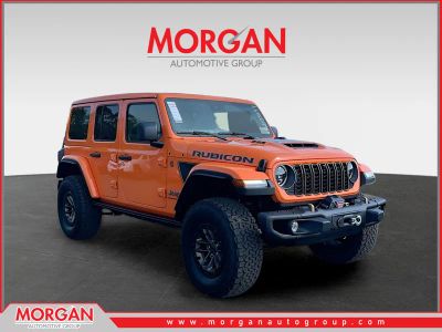 2025 Jeep Wrangler Rubicon 392 in Orange — front three-quarter view