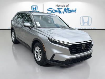 2024 Honda CR-V LX in Lunar Silver Metallic — front three-quarter view