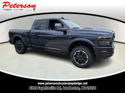 2026 RAM Ram 2500 RAM 2500 REBEL CREW CAB 4X4 6'4' BOX in Forged Blue Metallic Exterior Paint — front three-quarter view
