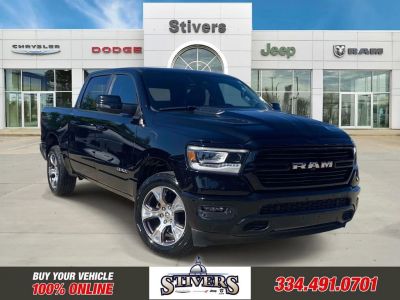 2023 Ram 1500 Laramie in Black — front three-quarter view