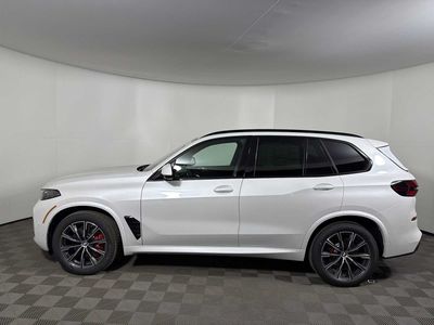 2026 BMW X5 xDrive40i — rear three-quarter view
