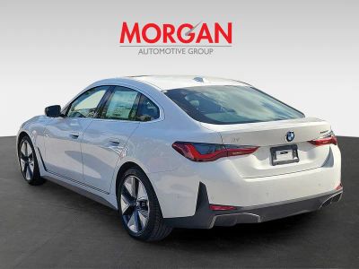 2026 BMW i4 — rear three-quarter view