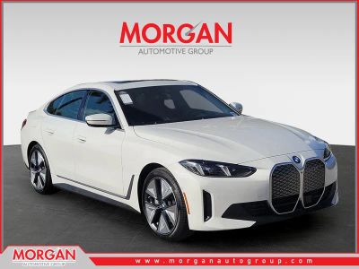 2026 BMW i4 xDrive40 in Alpine White — front three-quarter view