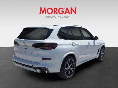 2026 BMW X5 — rear three-quarter view