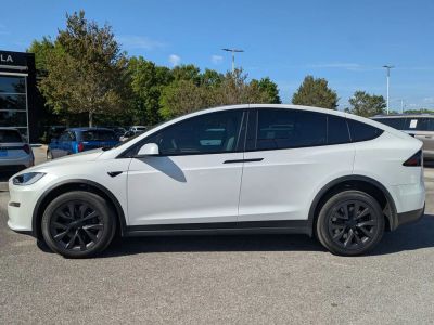 2024 Tesla Model X — rear three-quarter view