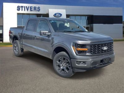 2026 Ford F-150 STX in Carbonized Gray Metallic — front three-quarter view