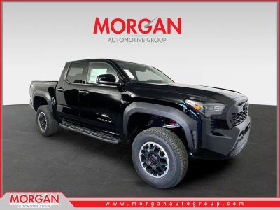 2026 Toyota Tacoma 4WD TRD Off Road in Black — front three-quarter view