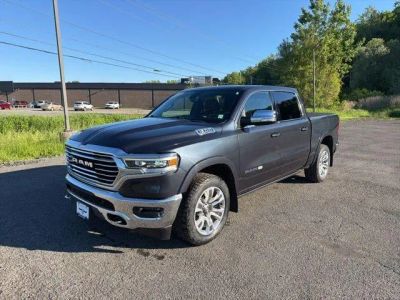 2019 RAM 1500 Longhorn in Gy — front three-quarter view