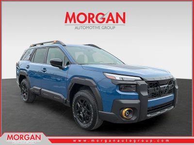 2026 Subaru Outback Wilderness in Geyser Blue — front three-quarter view