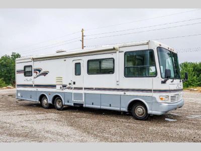 1997 Coachmen RV Santara — front three-quarter view