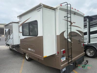 2012 Winnebago Sunstar — rear three-quarter view