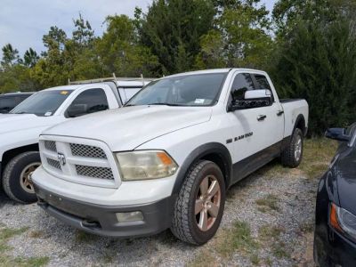 2012 Ram 1500 Outdoorsman in White — front three-quarter view